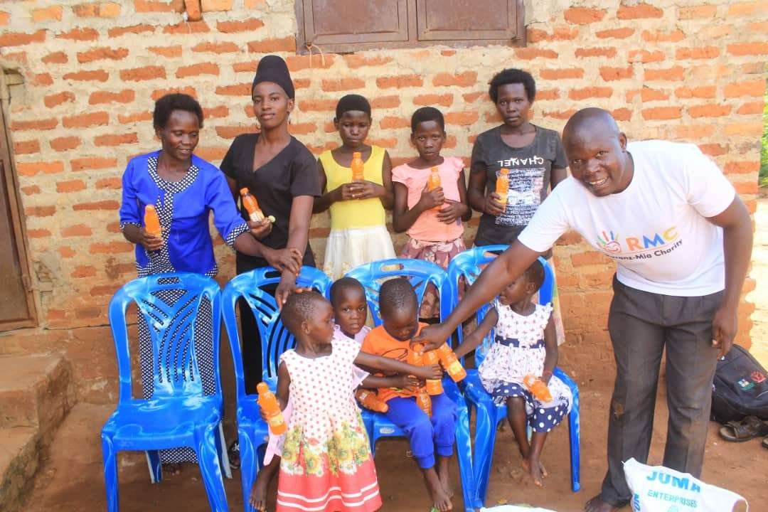 Sofiat and her children in Uganda