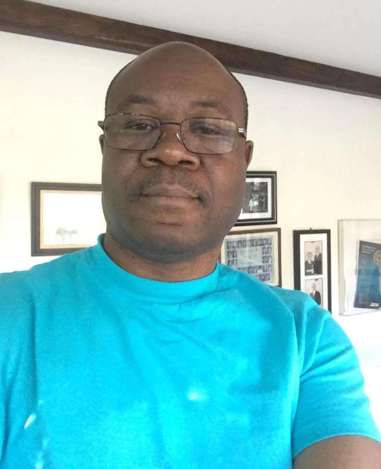 Founder of Ryvanz-Mia Charity with children