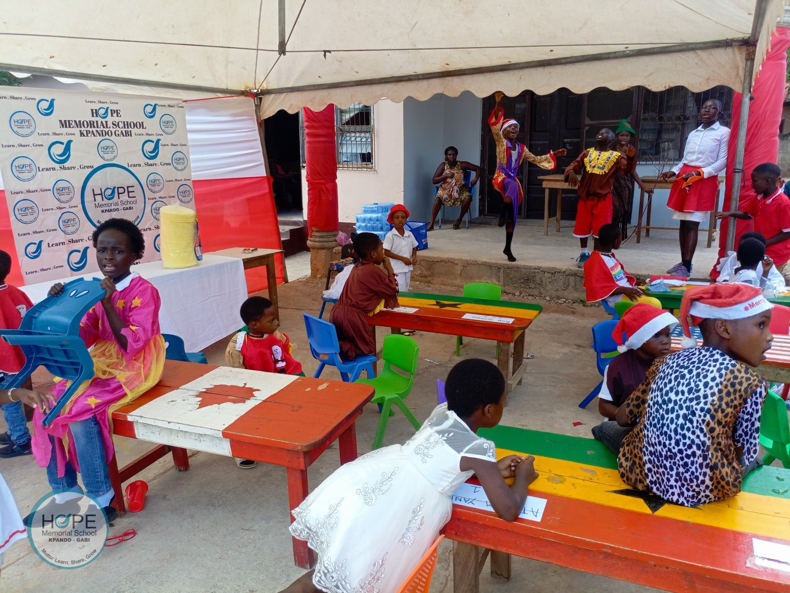 Children and supporters taking part in a school community celebration