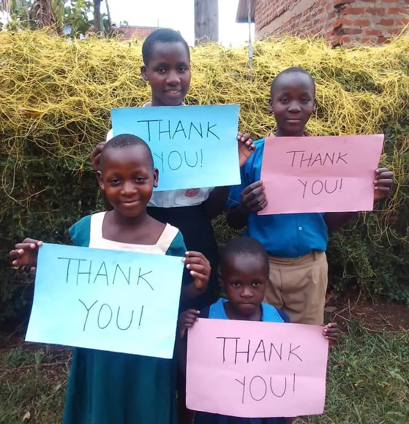 Children expressing appreciation during a Ryvanz-Mia Charity-supported activity