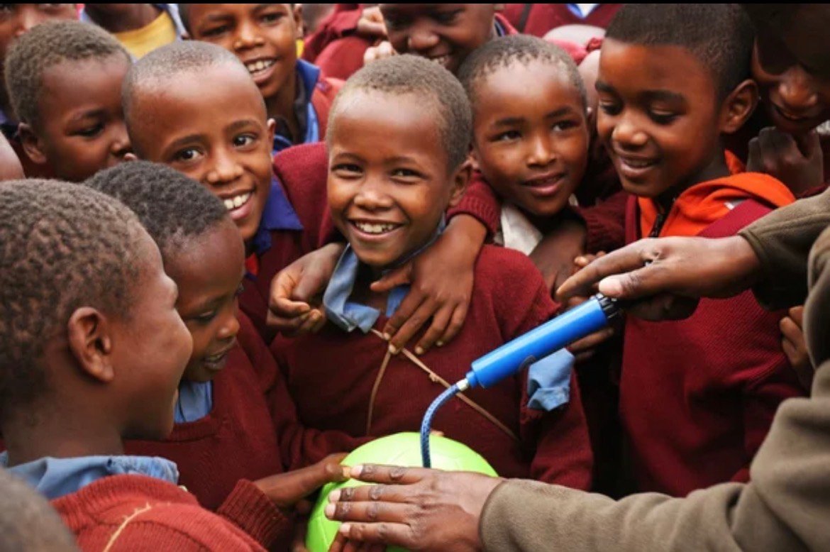 Children participating together in an educational community activity