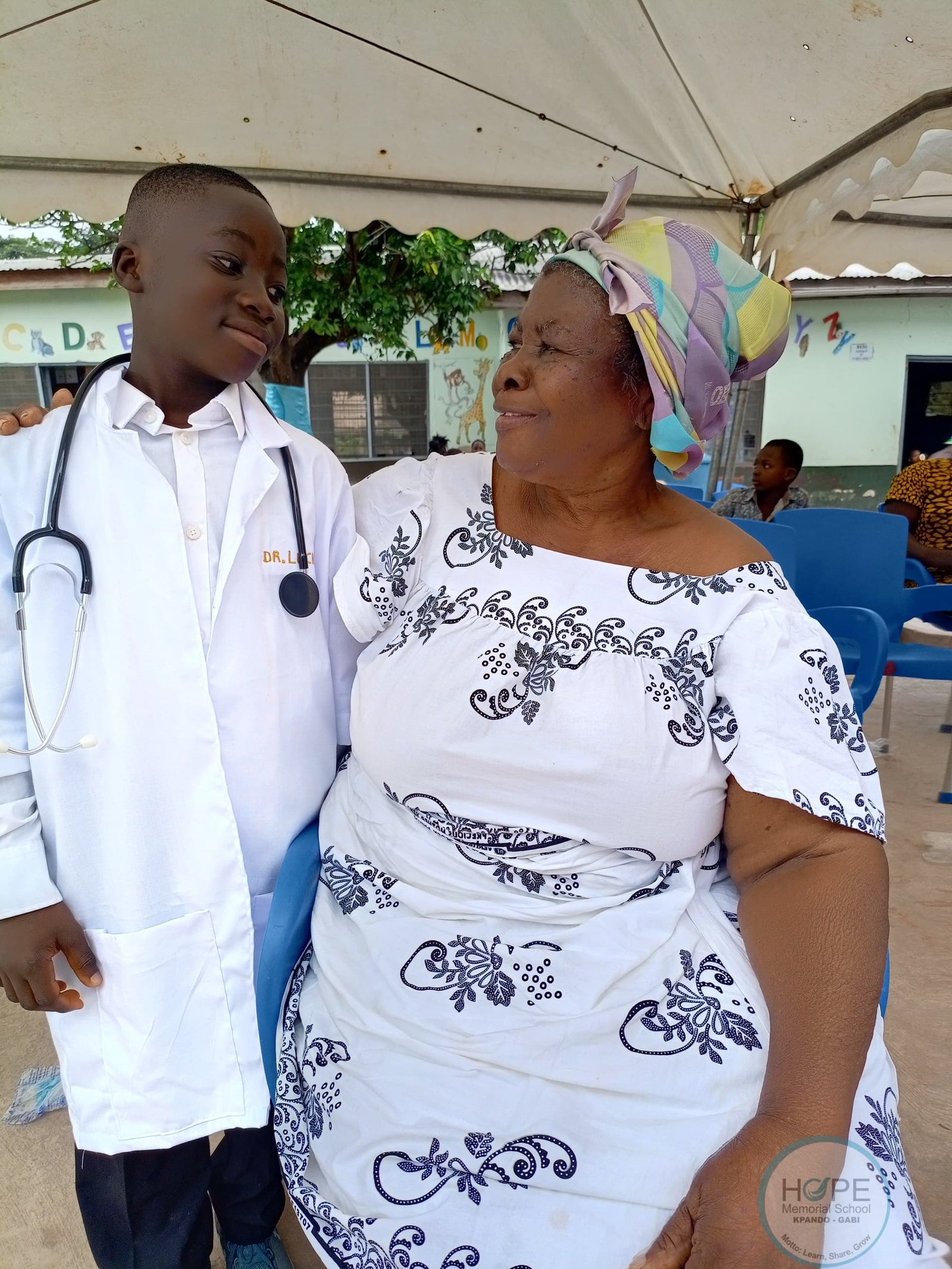 A child dressed as a doctor during an educational career activity