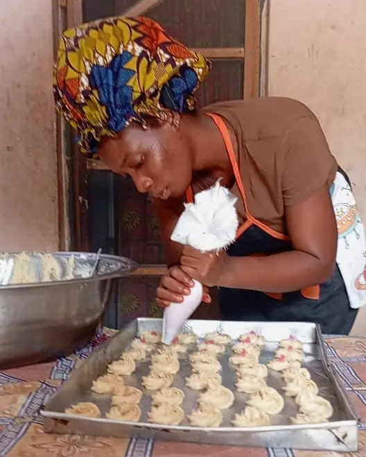 Young people participating in baking and practical skills training