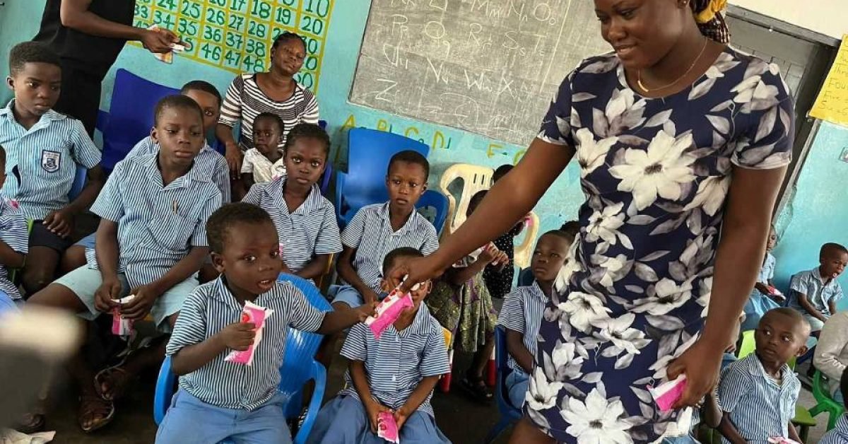 Hope Memorial School teacher sharing gifts to pupils Hope Memorial School teacher sharing gifts to pupils