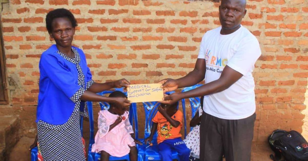 Support Sofiat and her children in Uganda with food and school supplies Support Sofiat and her children in Uganda - a mother with children in Katwe village.