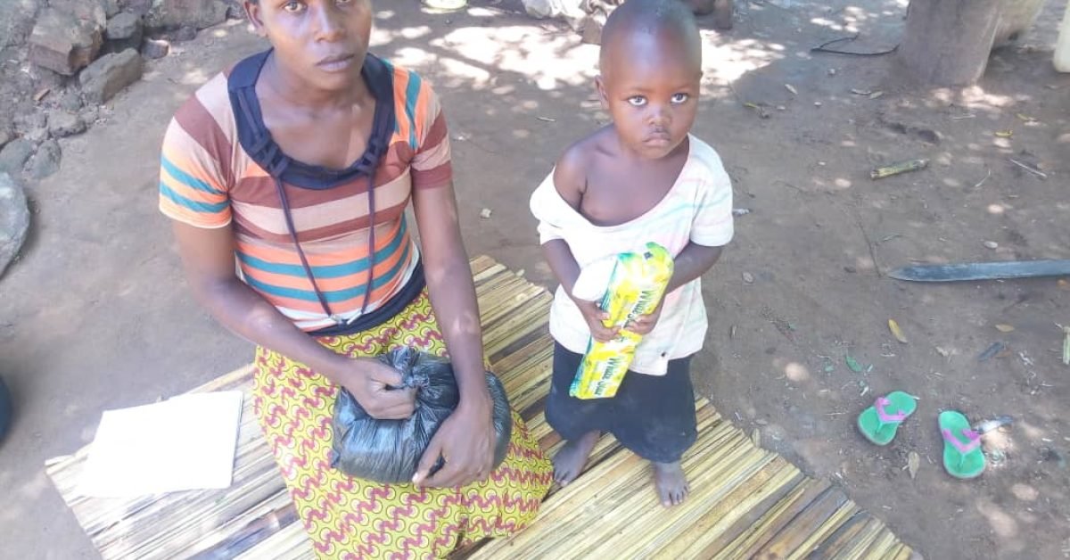 Vulnerable children receiving foodstuffs in Kaliro 2 Vulnerable children receiving foodstuffs in Kaliro